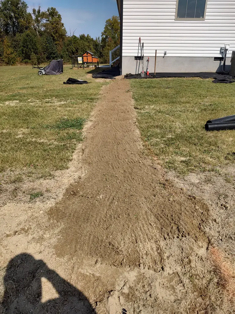 Underground gutter extension and drain line install