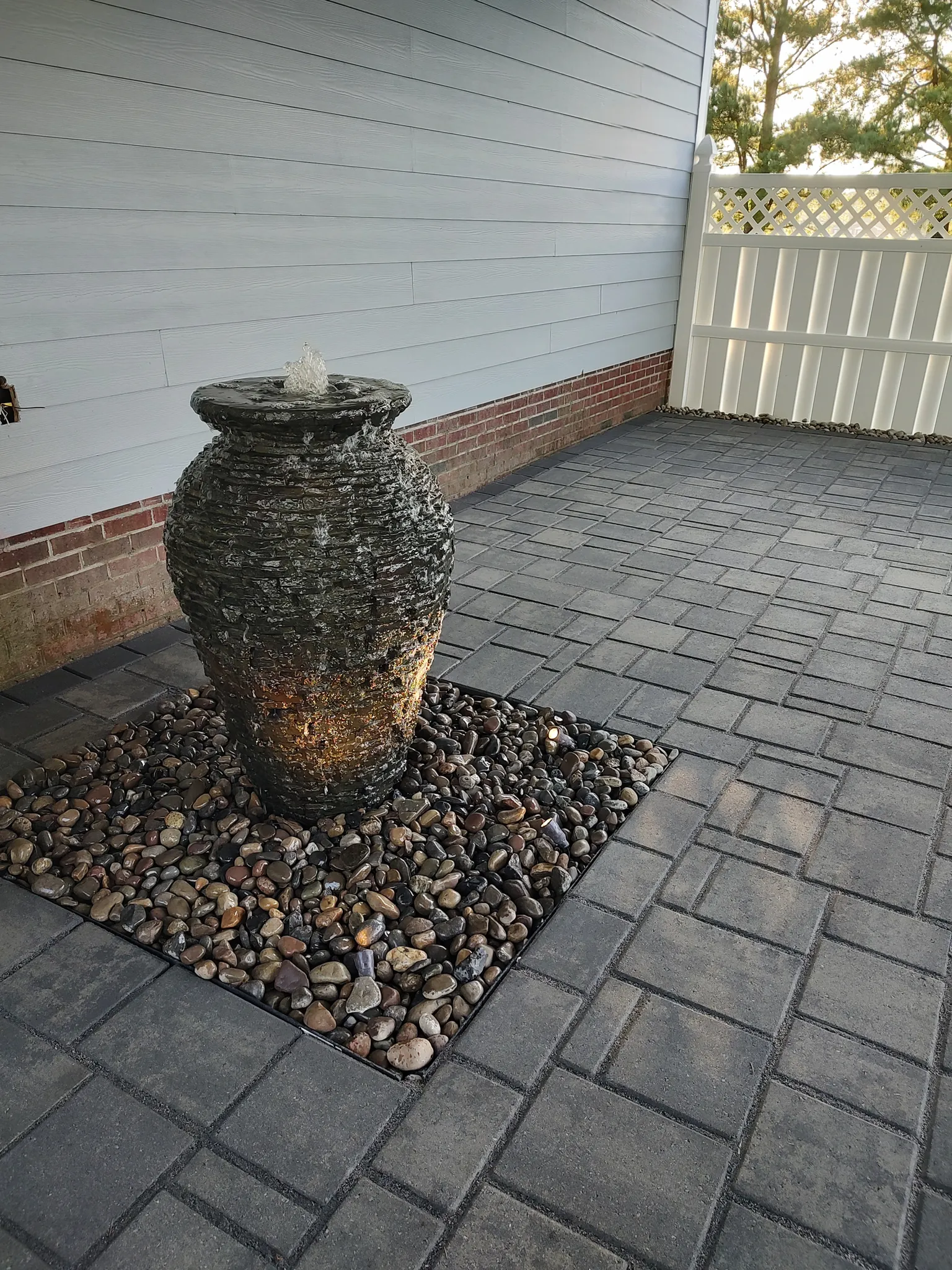 Covered patio and stone water feature detail
