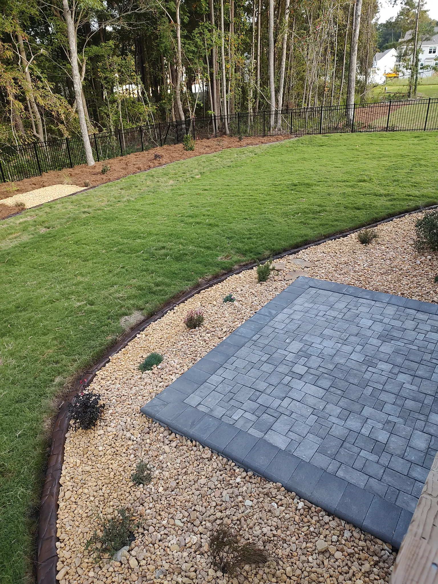 Paver patio and pea gravel walkway