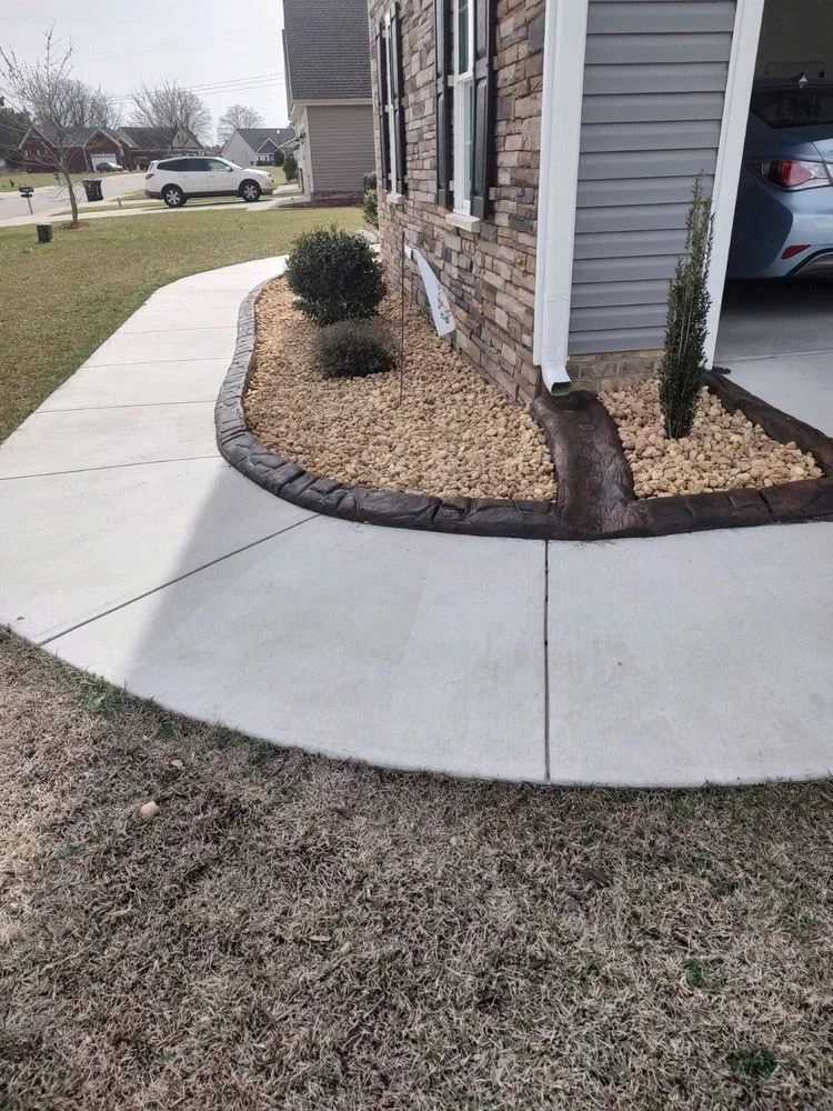 Residential drainage installation — French drain and grading solution in eastern NC
