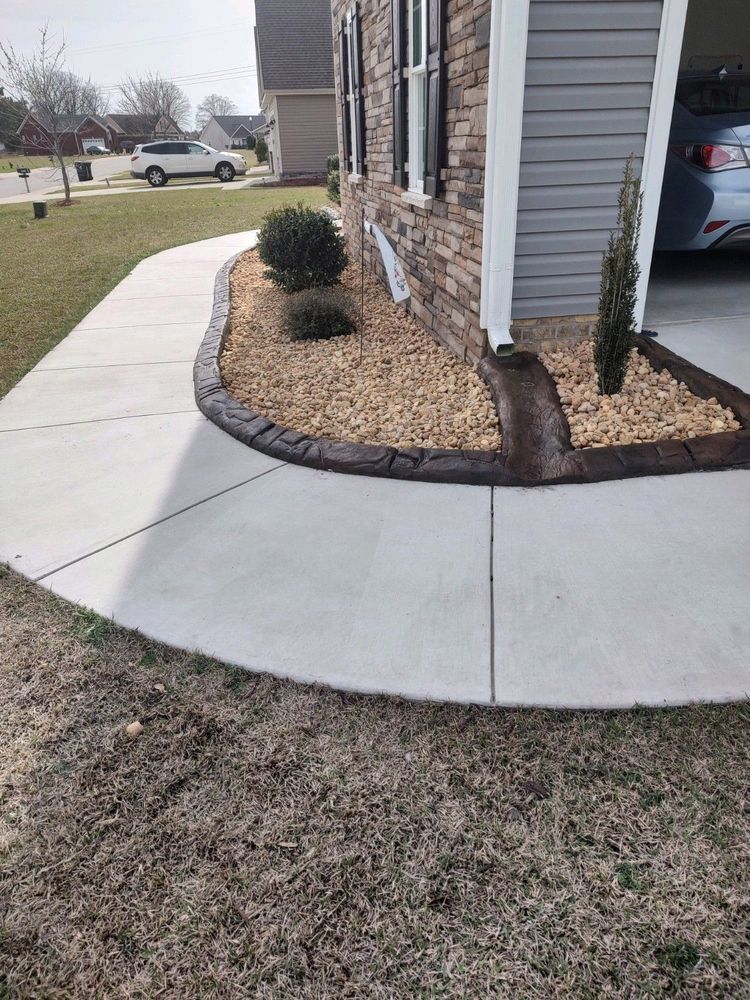 Residential drainage installation — French drain and grading solution in eastern NC